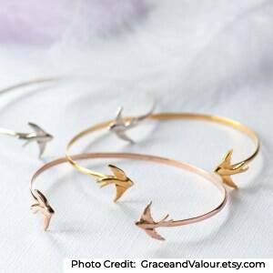 swallow bird bangle bracelet in silver, gold, and rose gold