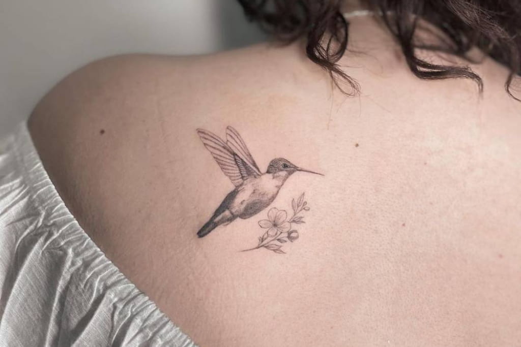Gild the Lily Tattoo - Cute hummingbird and flowers shoulder piece with new  Eternal inks. No photo editing needed for this one ❤🌷🐦 #shouldertattoo  #hummingbirdtattoo #hummingbird #flowertattoo #flowers #eternaltattooink  #eternalink ...
