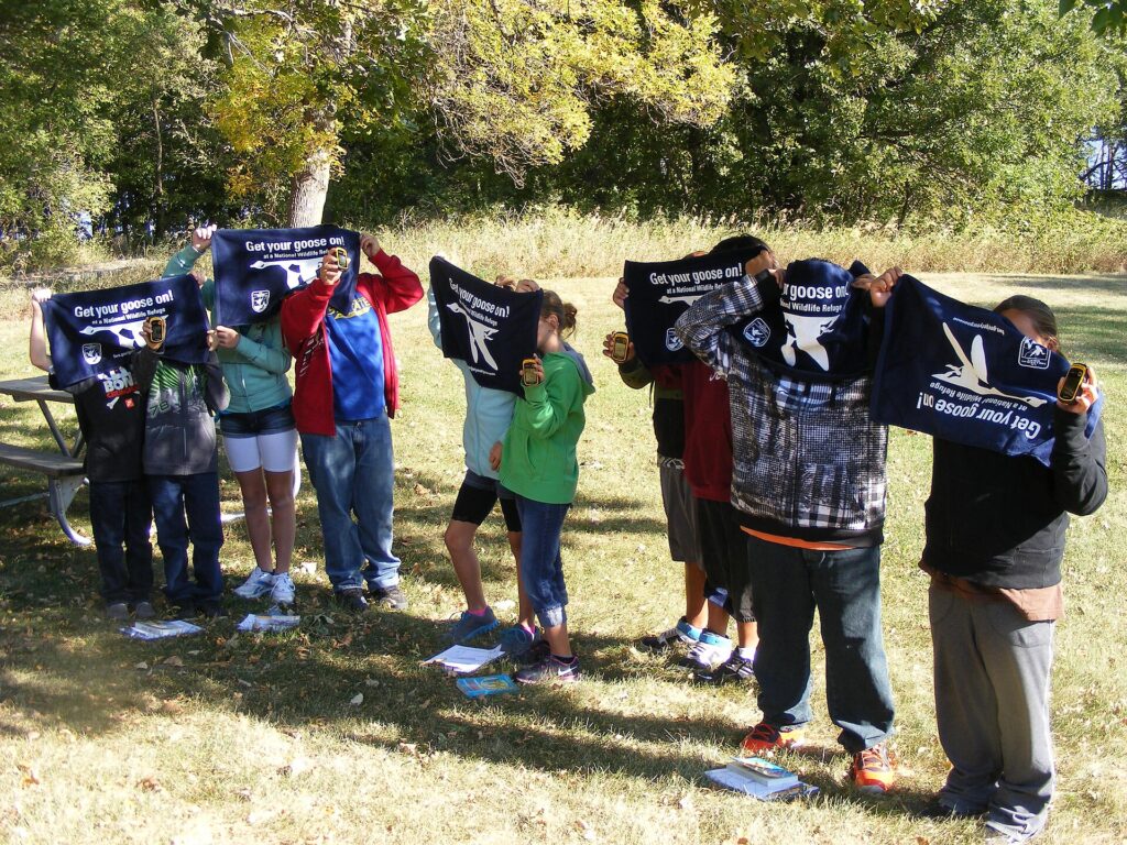 Kids on a birding hike at Waubay National Wildlife Refuge